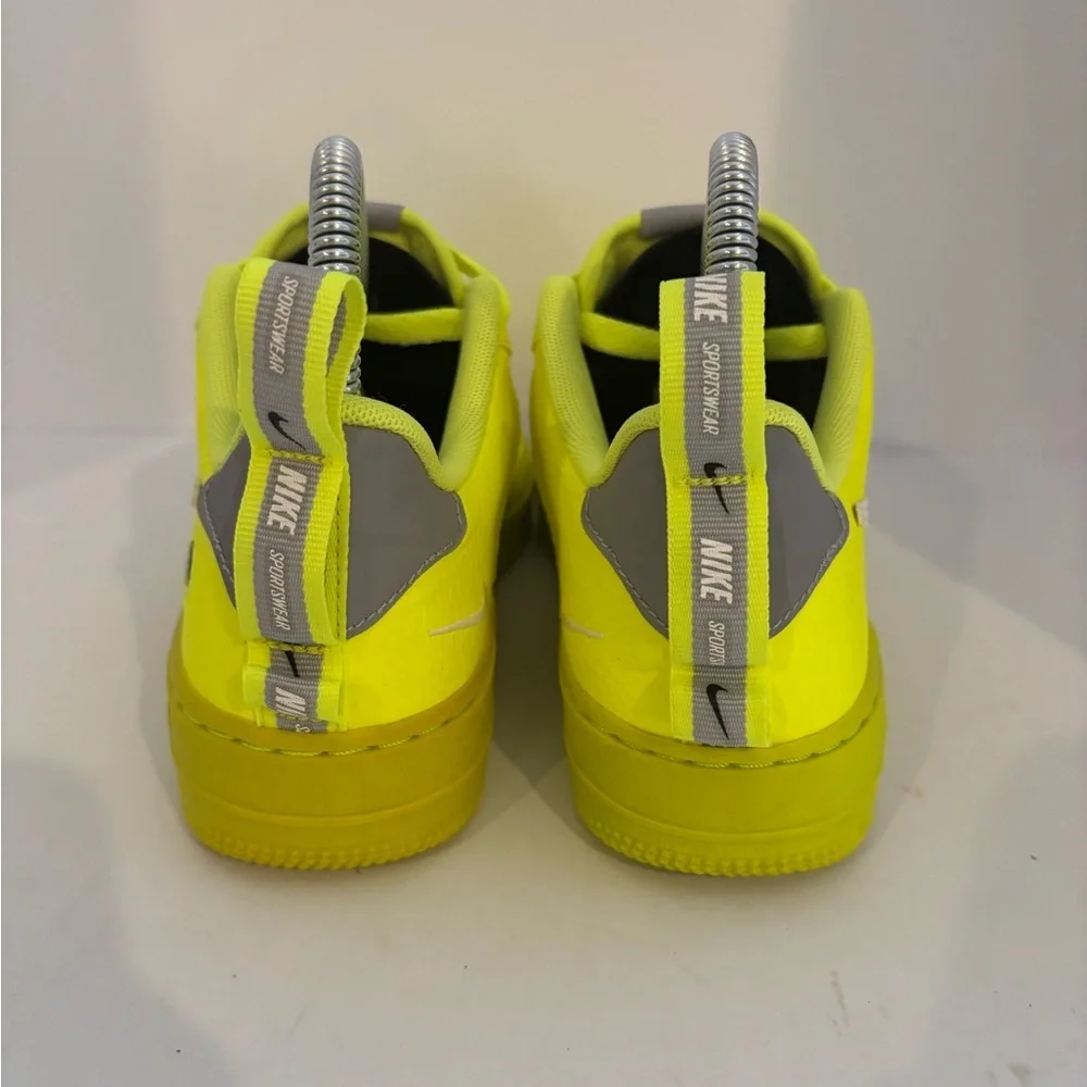Nike Low-Top Sneakers in Neon Yellow with White Swoosh size 4